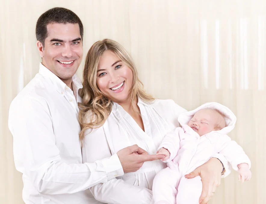 Young couple with a newborn baby