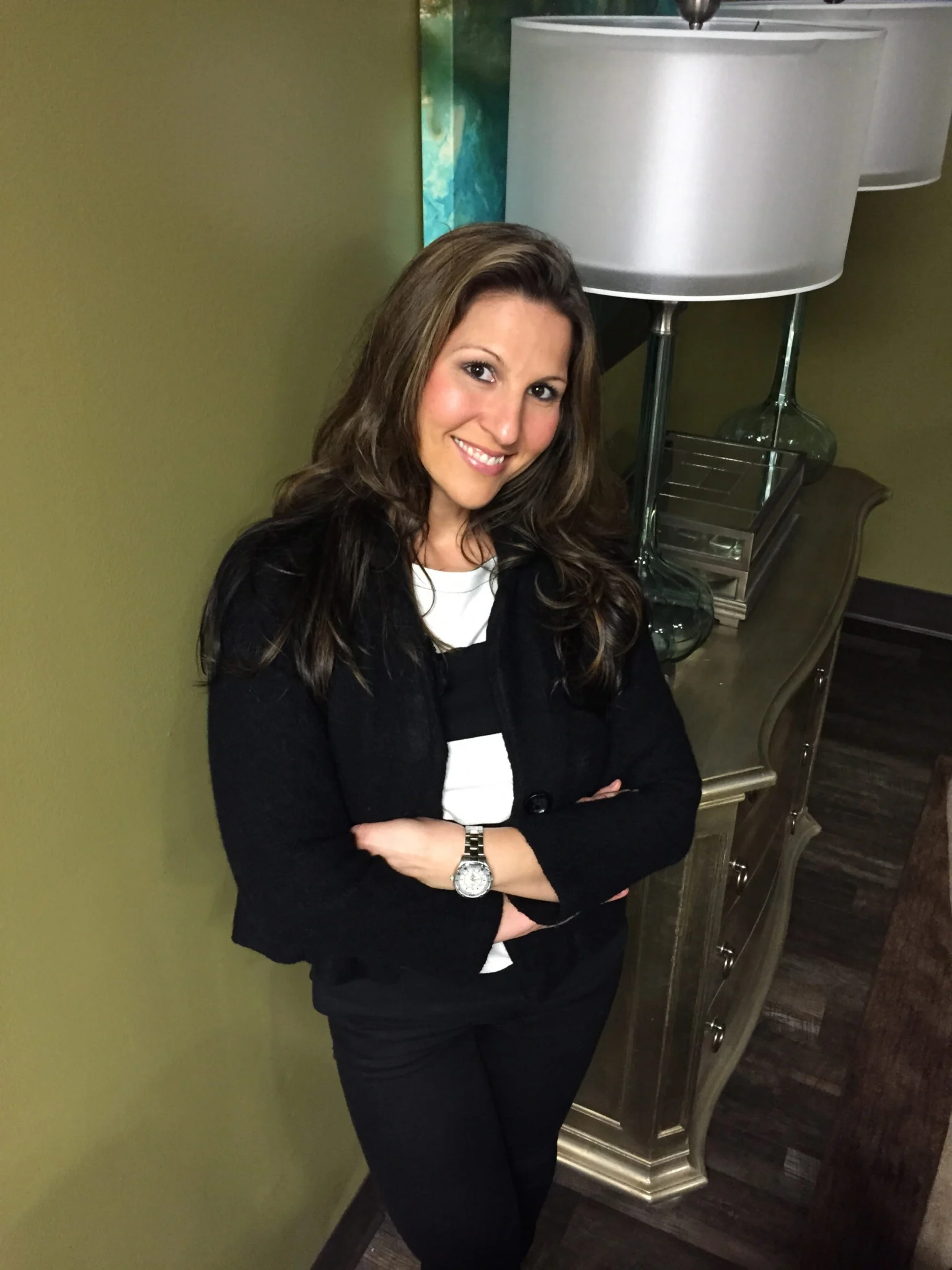 Serra Deville, founder and owner, in a black blazer
