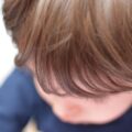 Charlotte nanny reading with a preschooler in Myers Park, salary guide overview