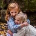 Two young children playing at a park in Savannah, Georgia after school