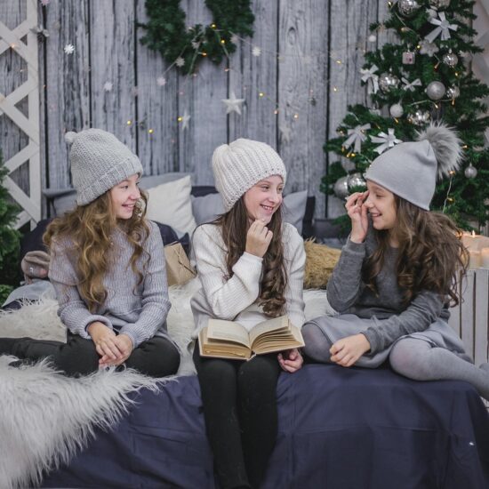 Nanny with children celebrating Christmas in Atlanta during winter break.